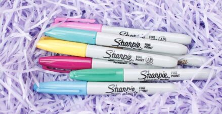 sharpie pens on purple confetti