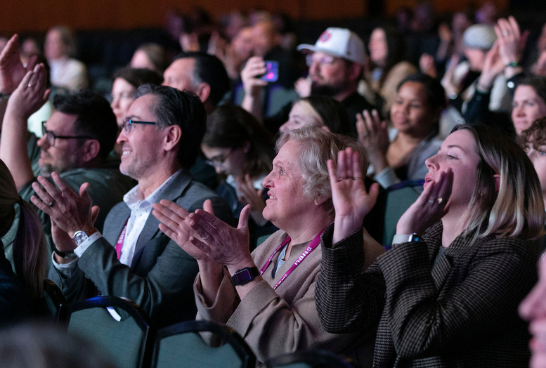 audience members at the 2025 thrive conference in nashville clapping